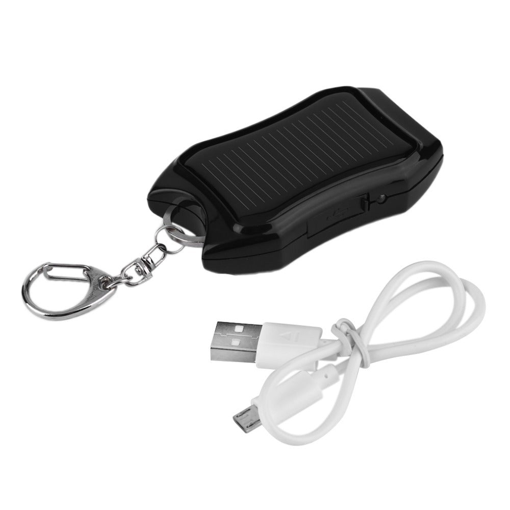 Mini powerbank op zonne-energie met ingebouwde zaklamp en sleutelhanger, geschikt voor mobiele telefoons